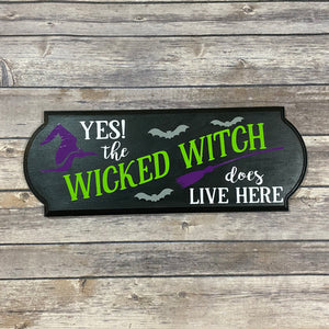 The Wicked Witch Lives Here Wooden Sign